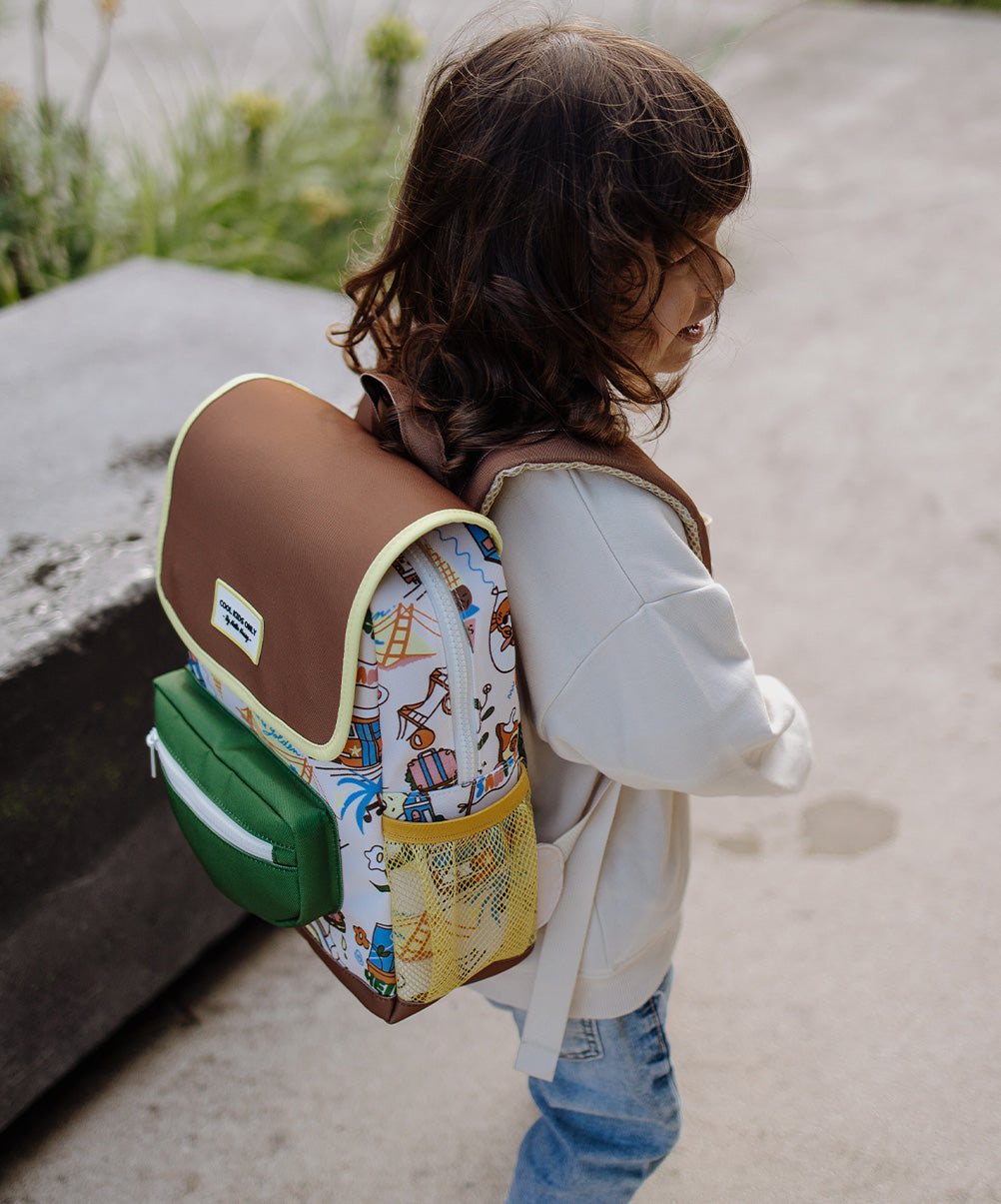 Mochila infantil creme com padrão de viagem USA, bolso em rede amarelo Hello Hossy