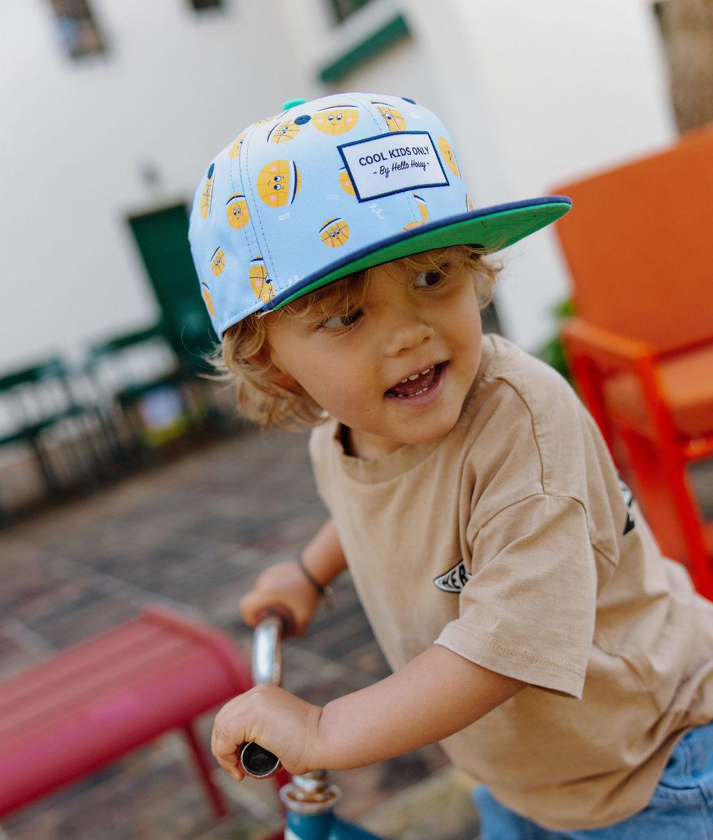 Boné infantil azul-claro com estampado de balões Hello Hossy