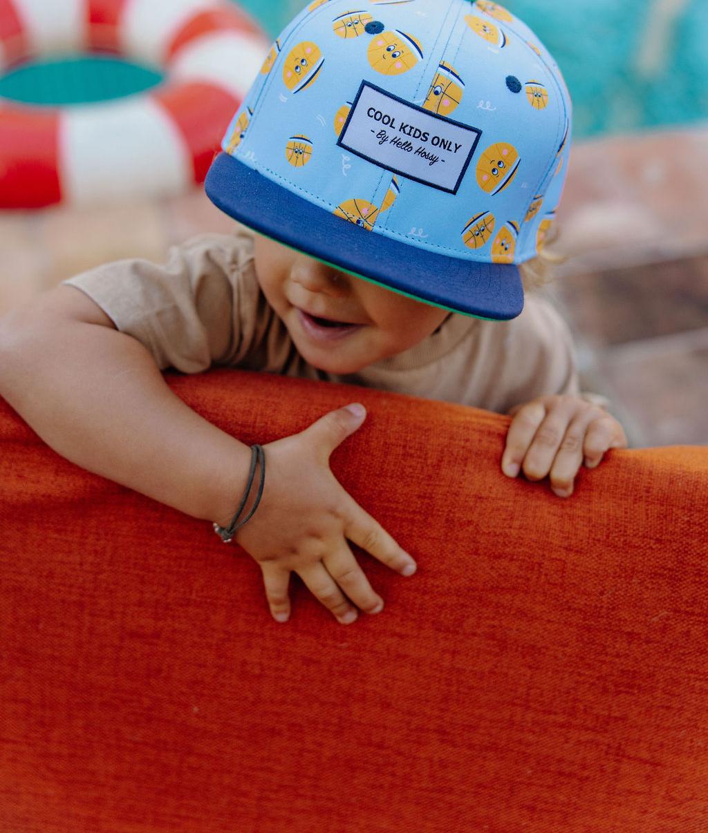 Boné infantil com estampado de balões amarelos, pala azul marine Hello Hossy