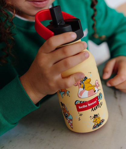 Garrafa reutilizável infantil amarela com padrão de unicórnio, pega vermelha Hello Hossy