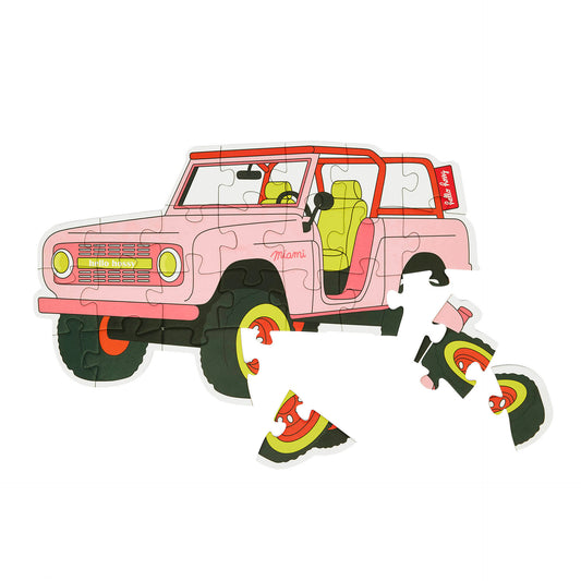 Puzzle infantil Hello Hossy "On The Road" parcialmente montado – vista de cima – fundo branco