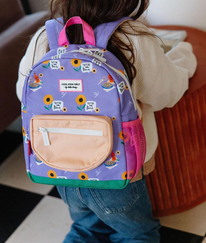 Mochila infantil violeta com estampado de flores e bolso bege Hello Hossy