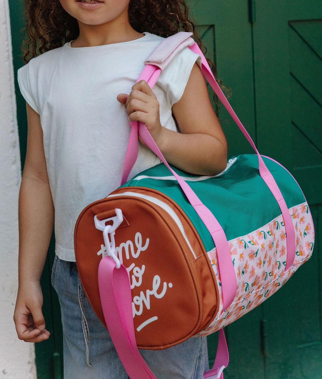 Saco de desporto infantil verde, rosa e castanho com padrão de flores Hello Hossy
