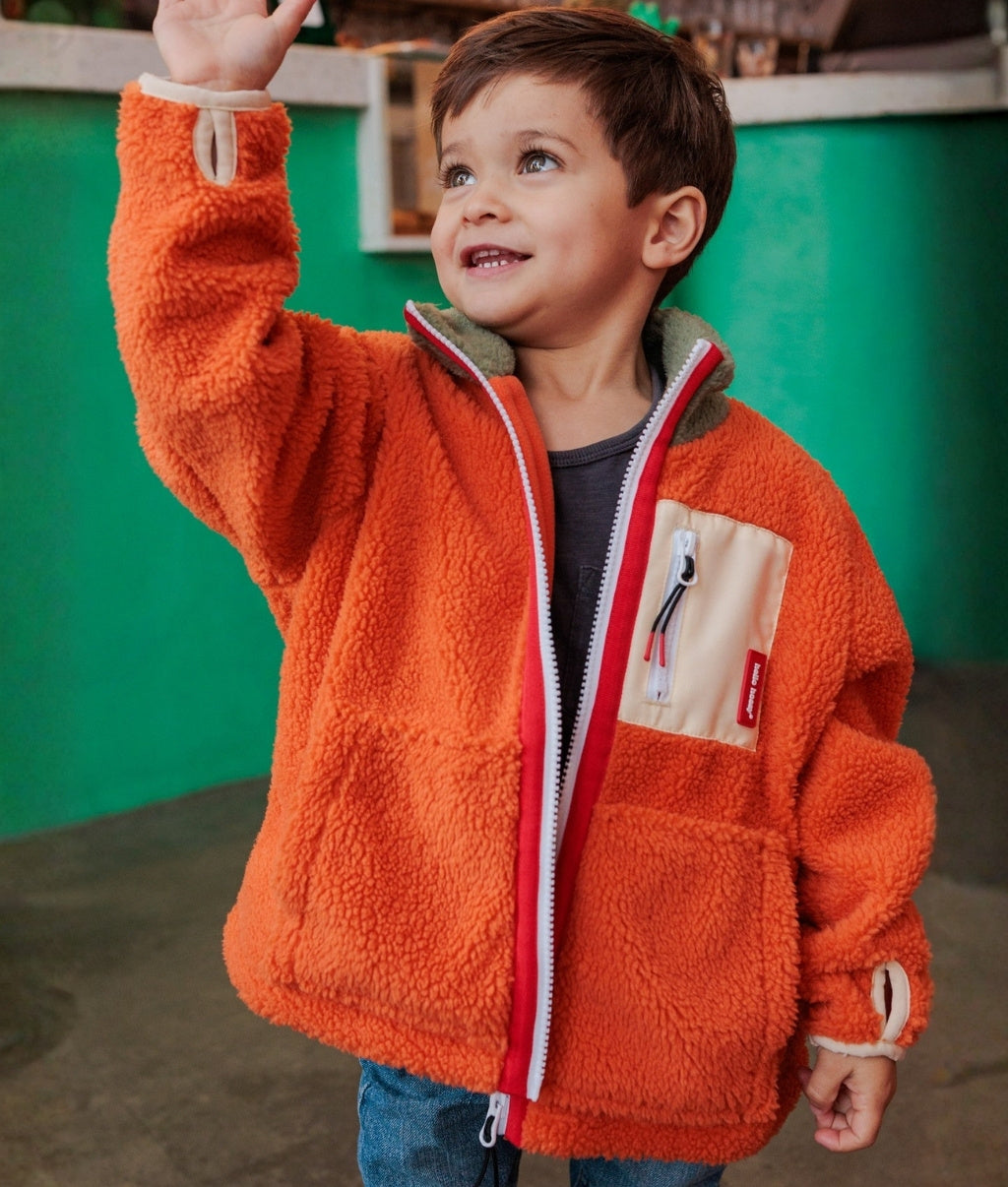 Casaco polar infantil laranja e bege, bolso com fecho Hello Hossy