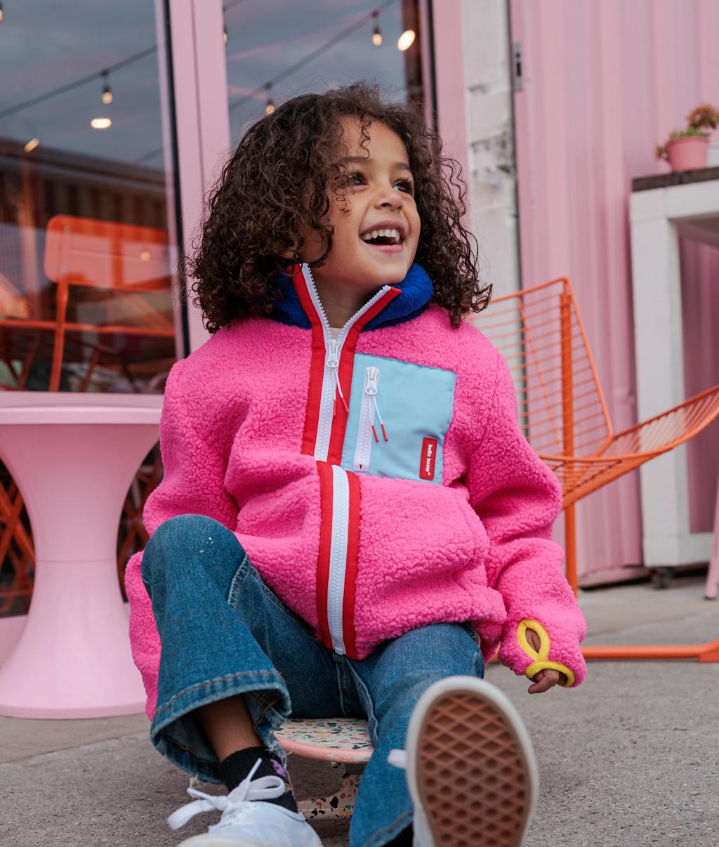 Casaco polar para criança fuchsia com bolso azul e gola alta Hello Hossy
