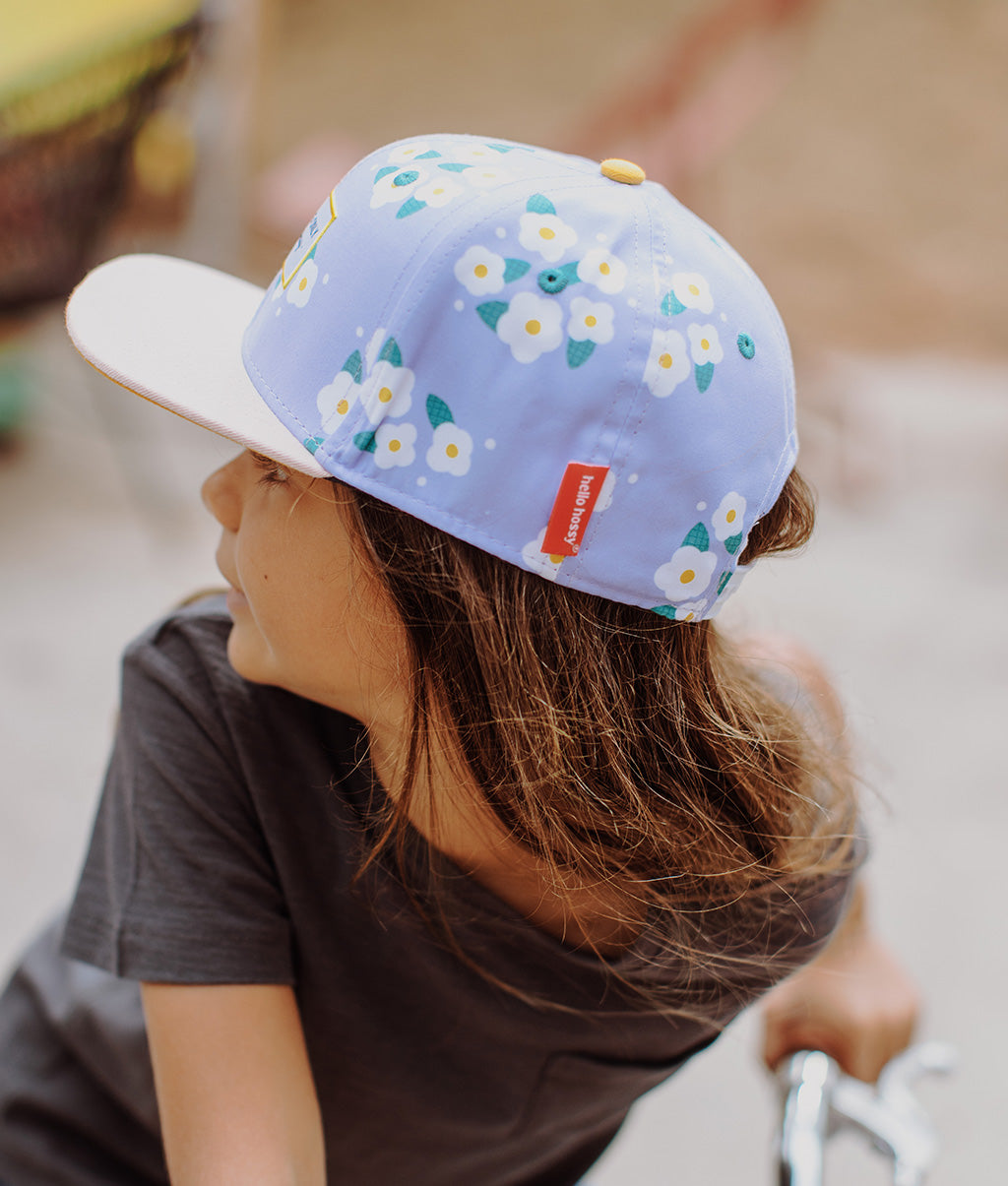 Boné infantil violeta estampado de flores com pala reta Hello Hossy