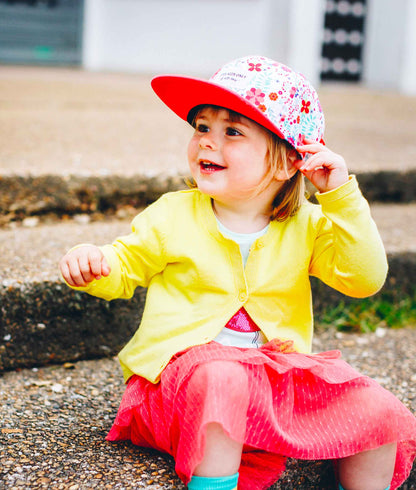 Boné infantil com estampado de flores e pala rosa Hello Hossy
